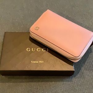 Gucci pink interlock medium zip wallet
